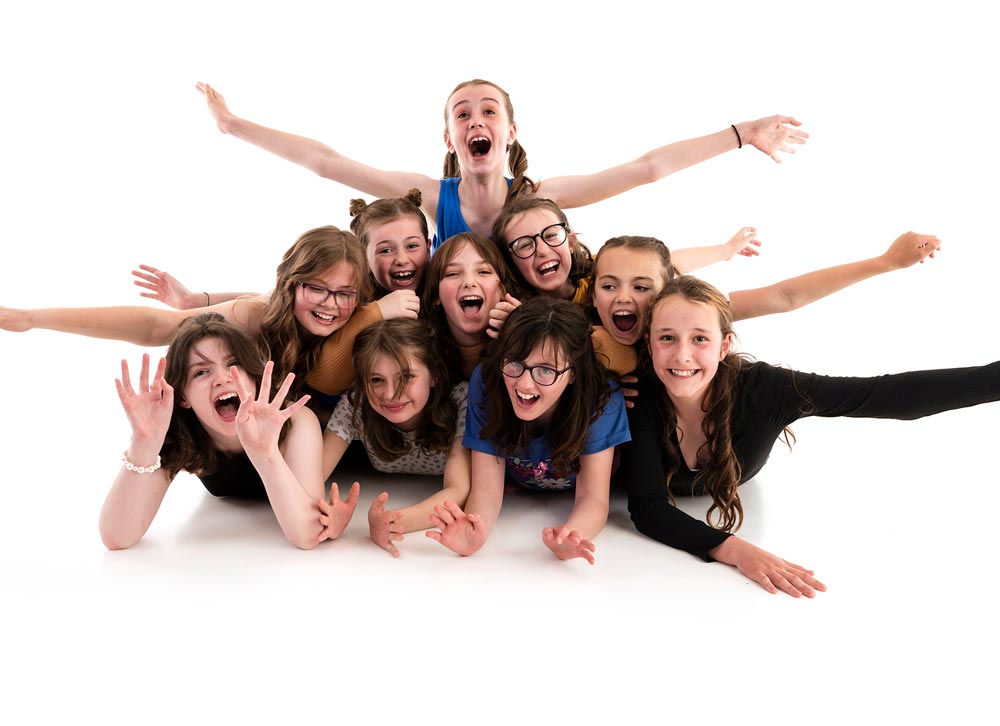 group of girls posing at a children's photoshoot party
