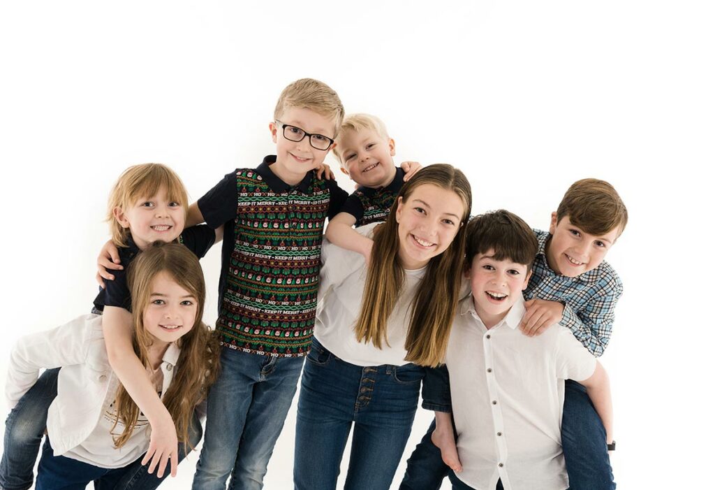 children posing together to show generations photoshoot